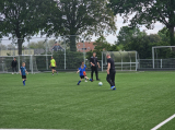 Laatste training S.K.N.W.K. JO10-1 (partijtje tegen de ouders) van woensdag 22 mei 2024 (78/133)
